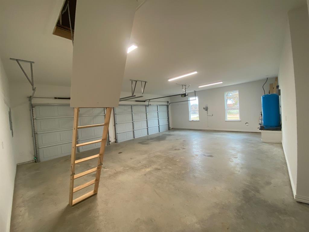 2284 Erwin Road Poolville, TX 76487 - Photo 24 of 24 3 car garage
