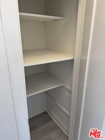 a view of a backyard with sitting area