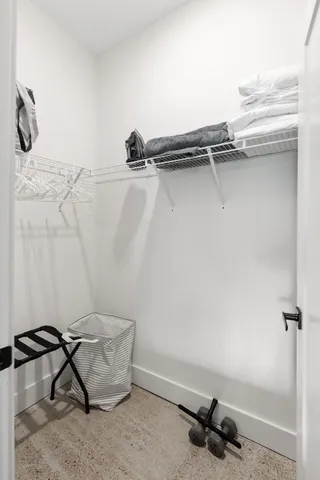 a view of a room with rack on the wall