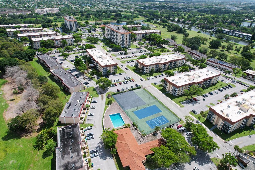 4174 Inverrary Drive, Unit 805 Lauderhill, FL 33319 - Photo 16 of 26 an aerial view of a city with lots of residential buildings