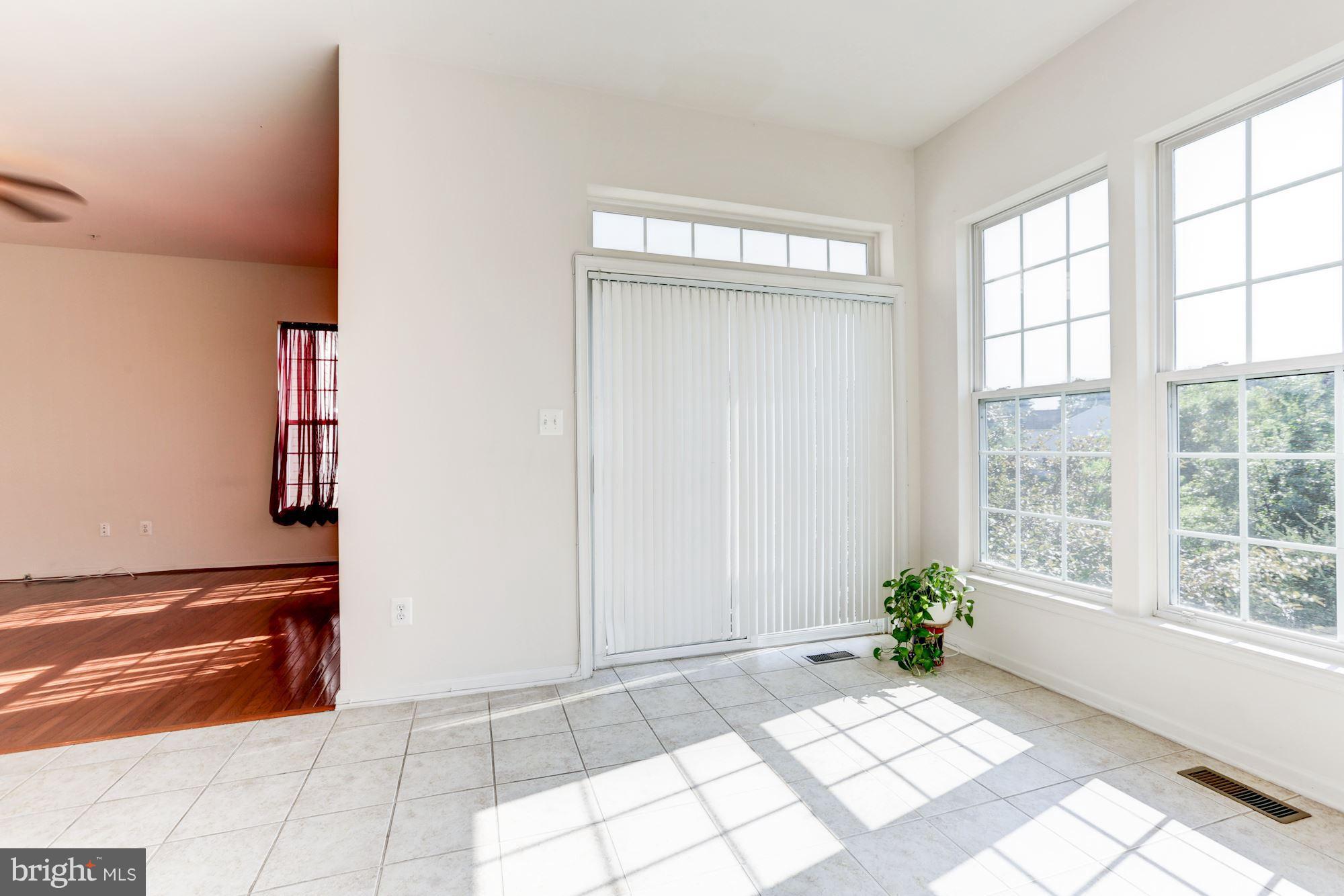 71 Inkberry Circle Gaithersburg, MD 20877 - Photo 12 of 30 Light-Filled Sunroom