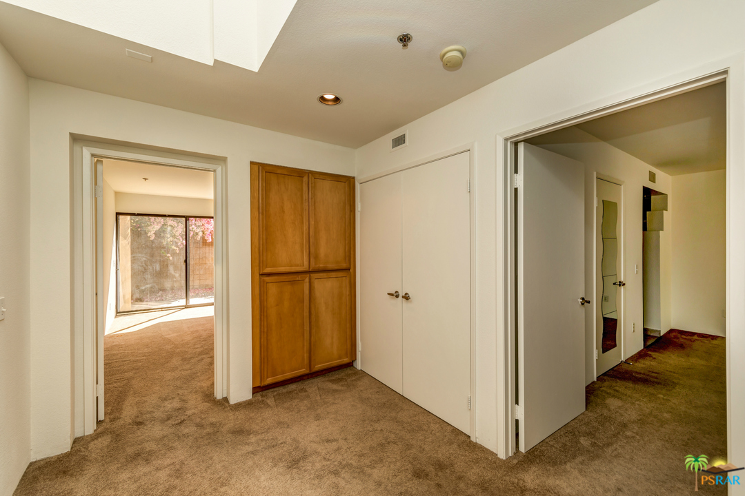 100 East Stevens Road, Unit 513 Palm Springs, CA 92262 - Photo 24 of 39 a view of entryway with wooden floor