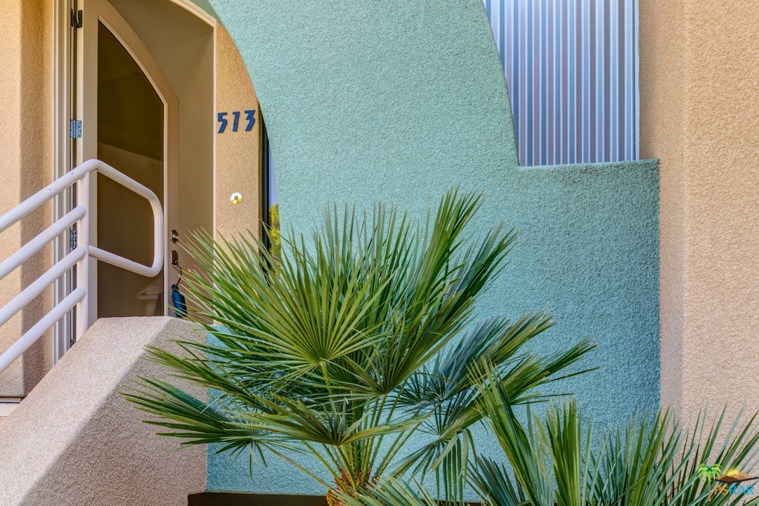 100 East Stevens Road, Unit 513 Palm Springs, CA 92262 - Photo 3 of 39 a view of a potted plant in front of a building