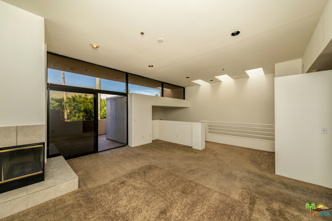 100 East Stevens Road, Unit 513 Palm Springs, CA 92262 - Photo 8 of 39 a view of a livingroom with a staircase