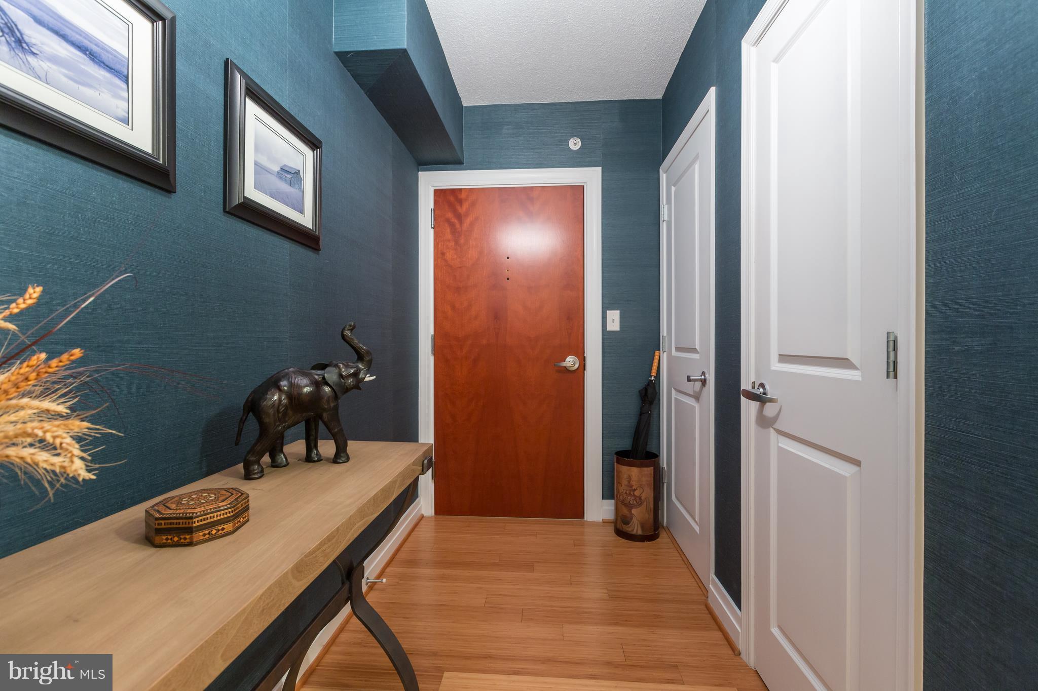 915 E Street Northwest, Unit 613 Washington, DC 20004 - Photo 3 of 30 a view of a hallway with a dining room view