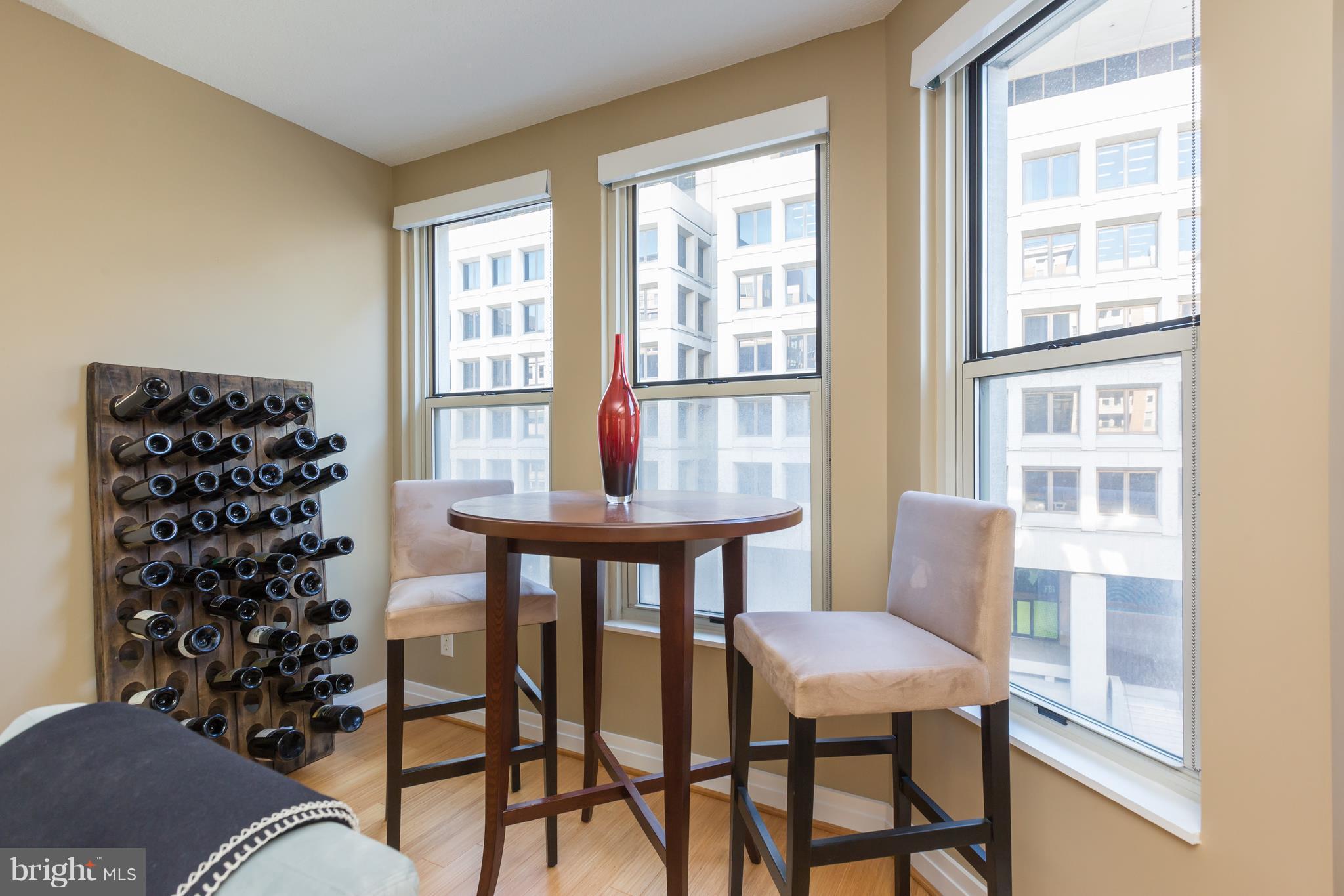 915 E Street Northwest, Unit 613 Washington, DC 20004 - Photo 21 of 30 a view of a dining room with furniture window and outside view