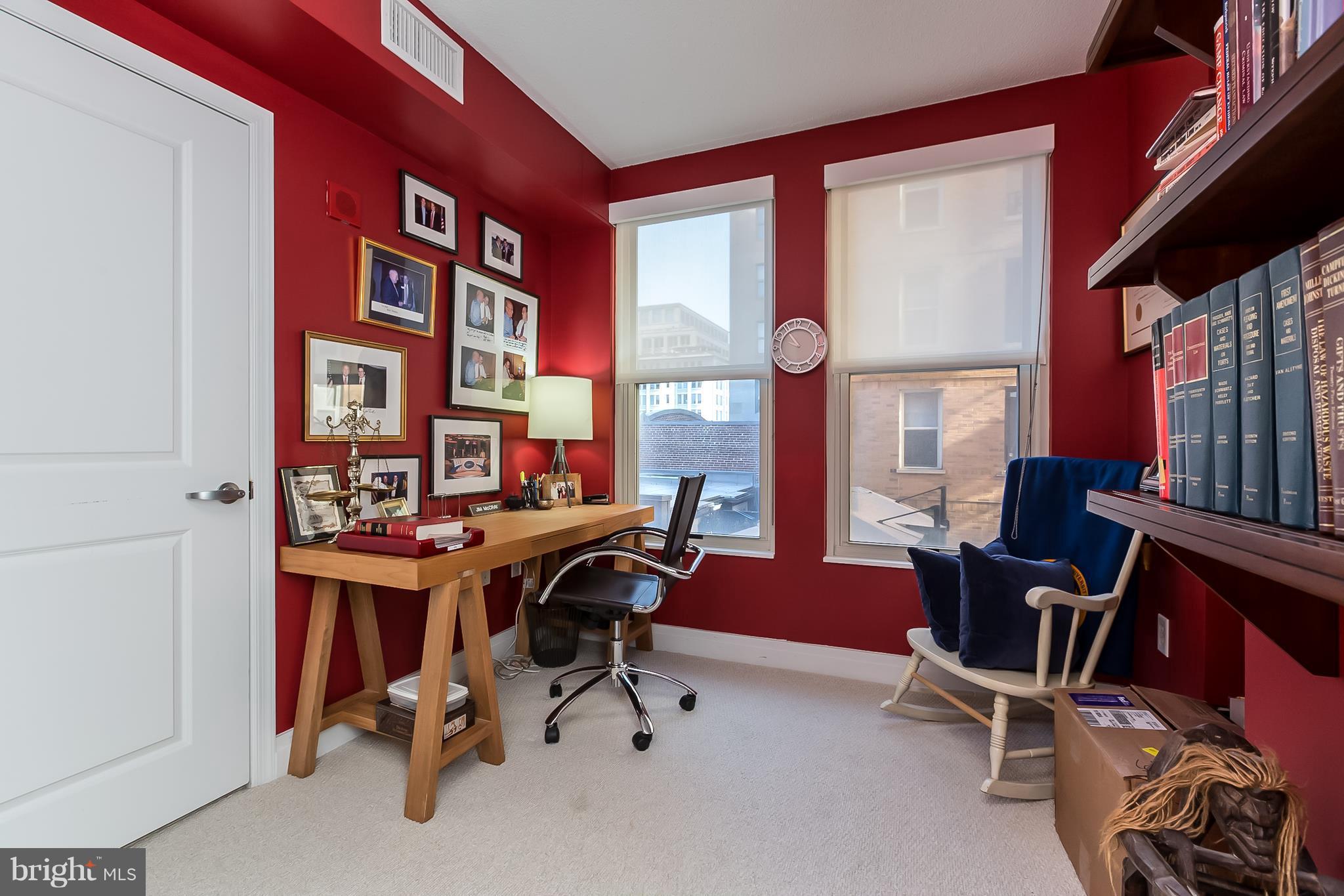 915 E Street Northwest, Unit 613 Washington, DC 20004 - Photo 8 of 30 a view of a workspace with furniture and a window
