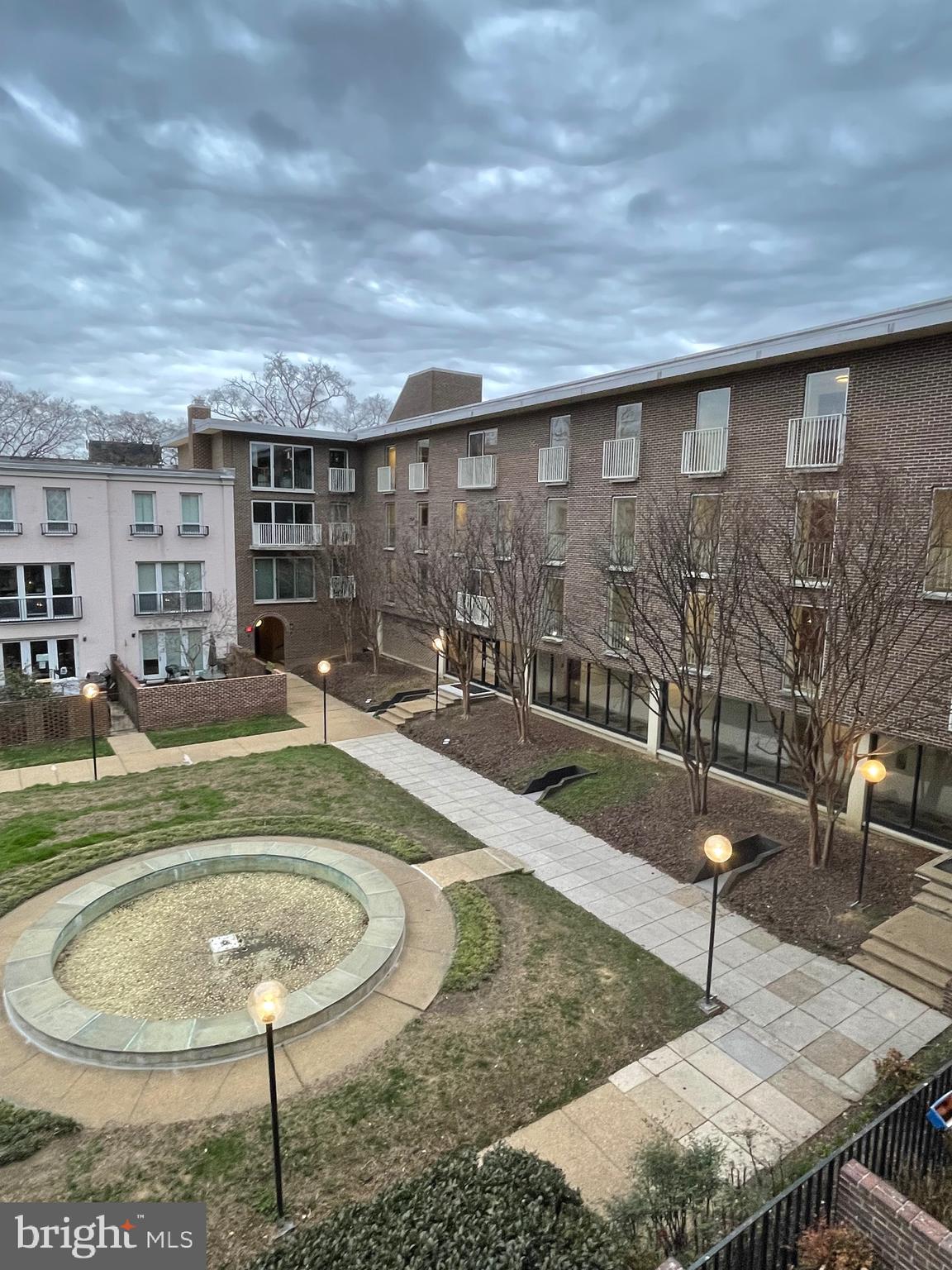 520 N Street Southwest, Unit S317 Washington, DC 20024 - Photo 27 of 64 a swimming pool with outdoor seating and plants
