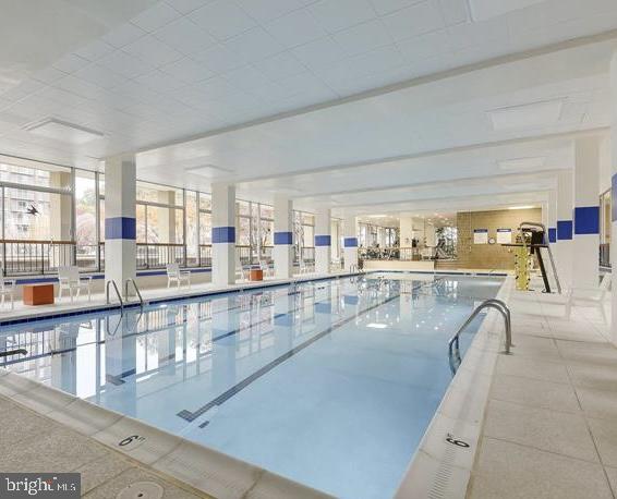 520 N Street Southwest, Unit S317 Washington, DC 20024 - Photo 48 of 64 a dining hall with stainless steel appliances granite countertop a lots of white cabinets