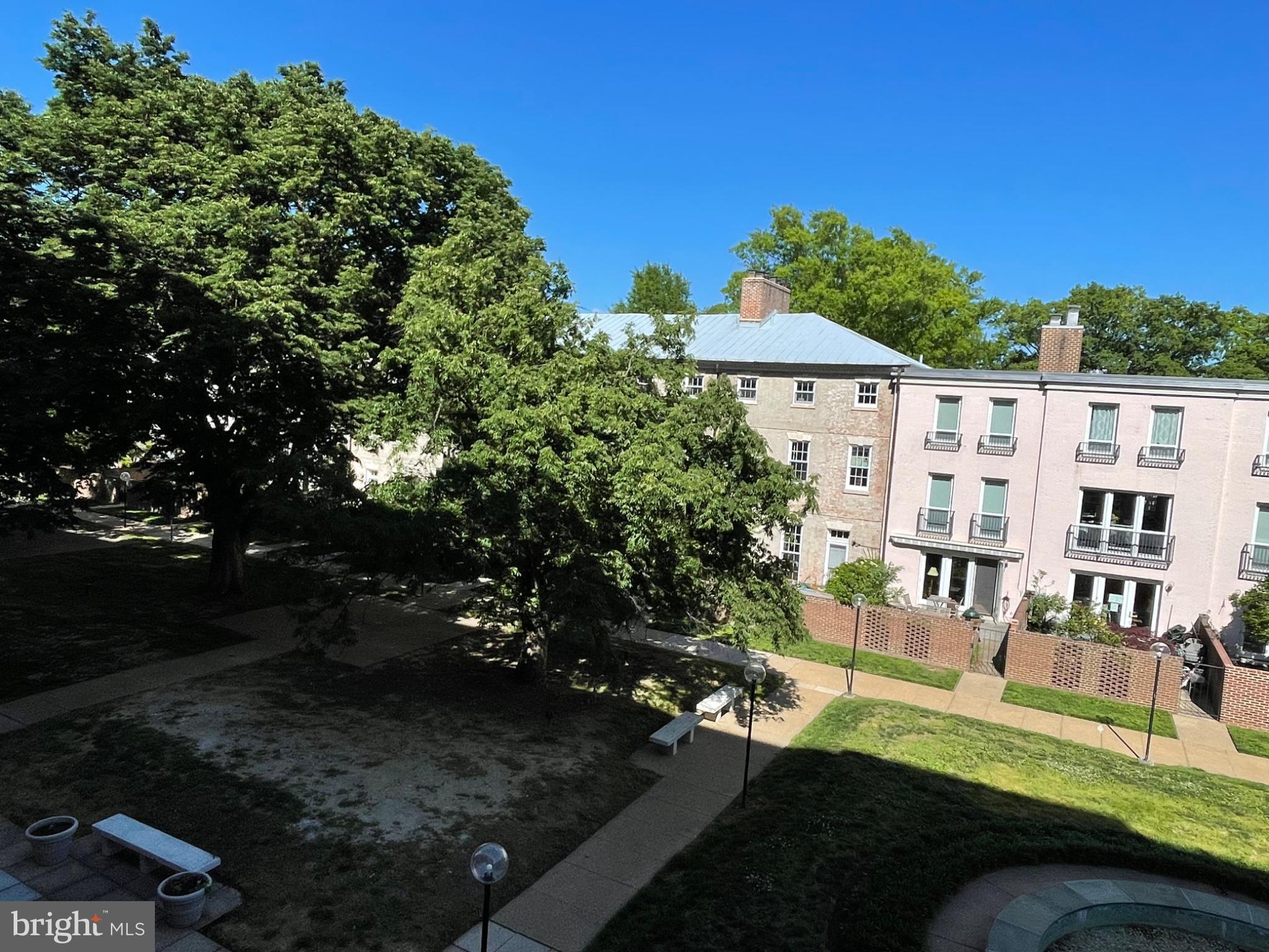 520 N Street Southwest, Unit S317 Washington, DC 20024 - Photo 70 of 74 Charming courtyard with lush greenery.