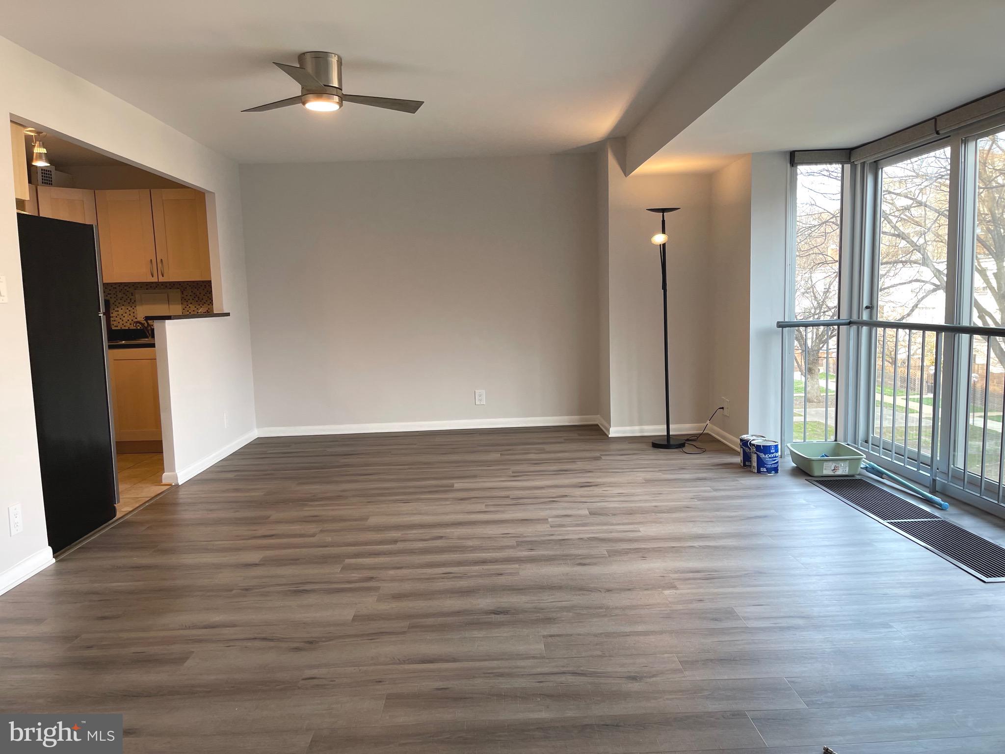 520 N Street Southwest, Unit S317 Washington, DC 20024 - Photo 10 of 64 a view of empty room with wooden floor and fan
