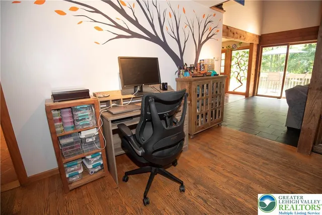 a view of a furniture window and wooden floor