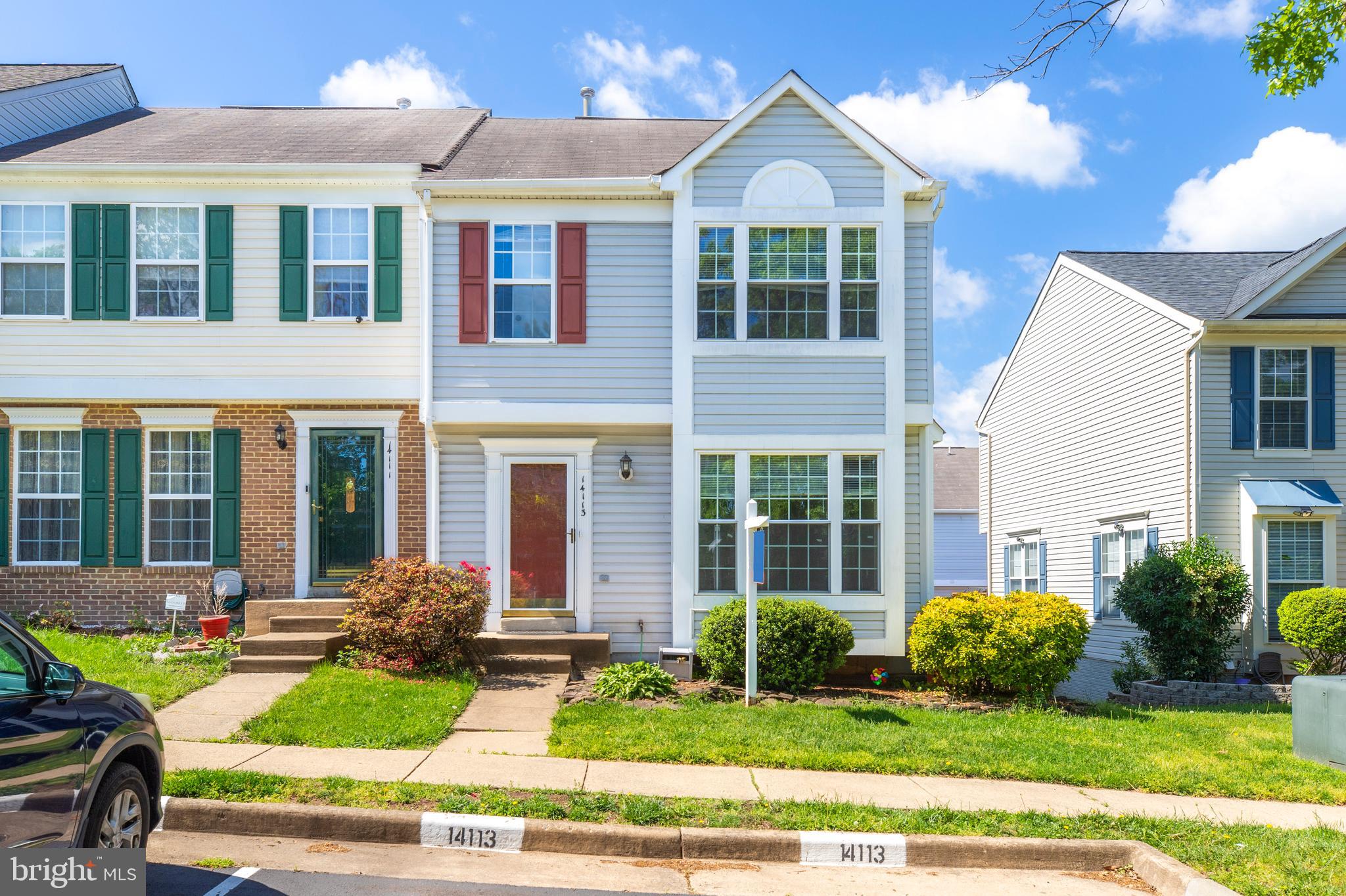 14113 Asher View Centreville, VA 20121 - Photo 2 of 47 a front view of a house with a yard