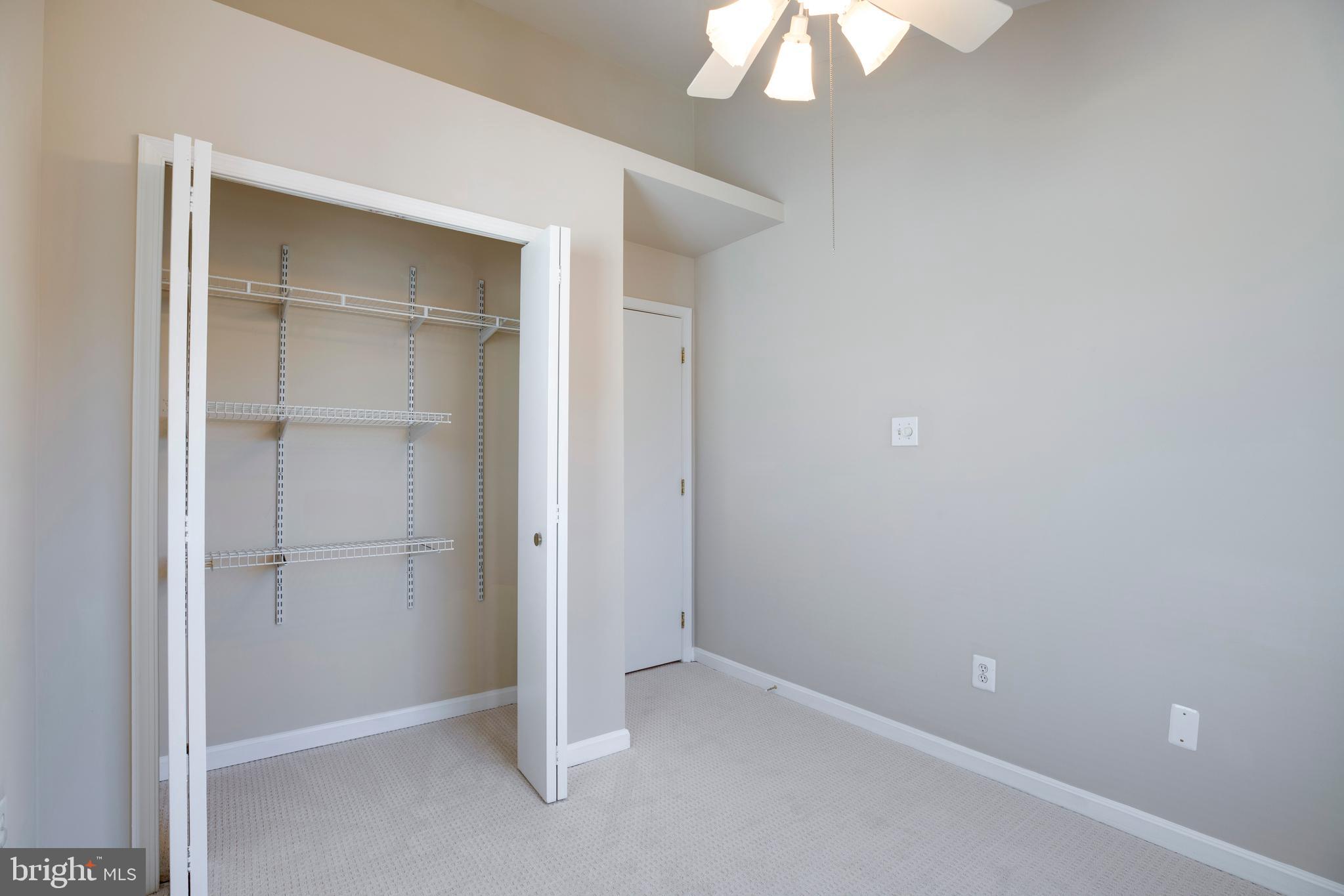 14113 Asher View Centreville, VA 20121 - Photo 26 of 47 a view of an empty room with a ceiling fan