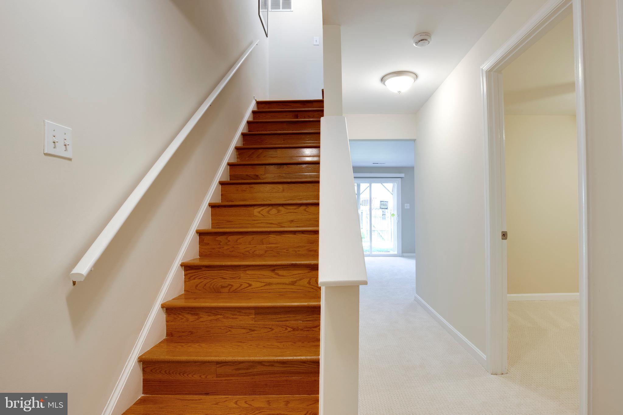 14113 Asher View Centreville, VA 20121 - Photo 32 of 47 a view of entryway and hall with wooden floor