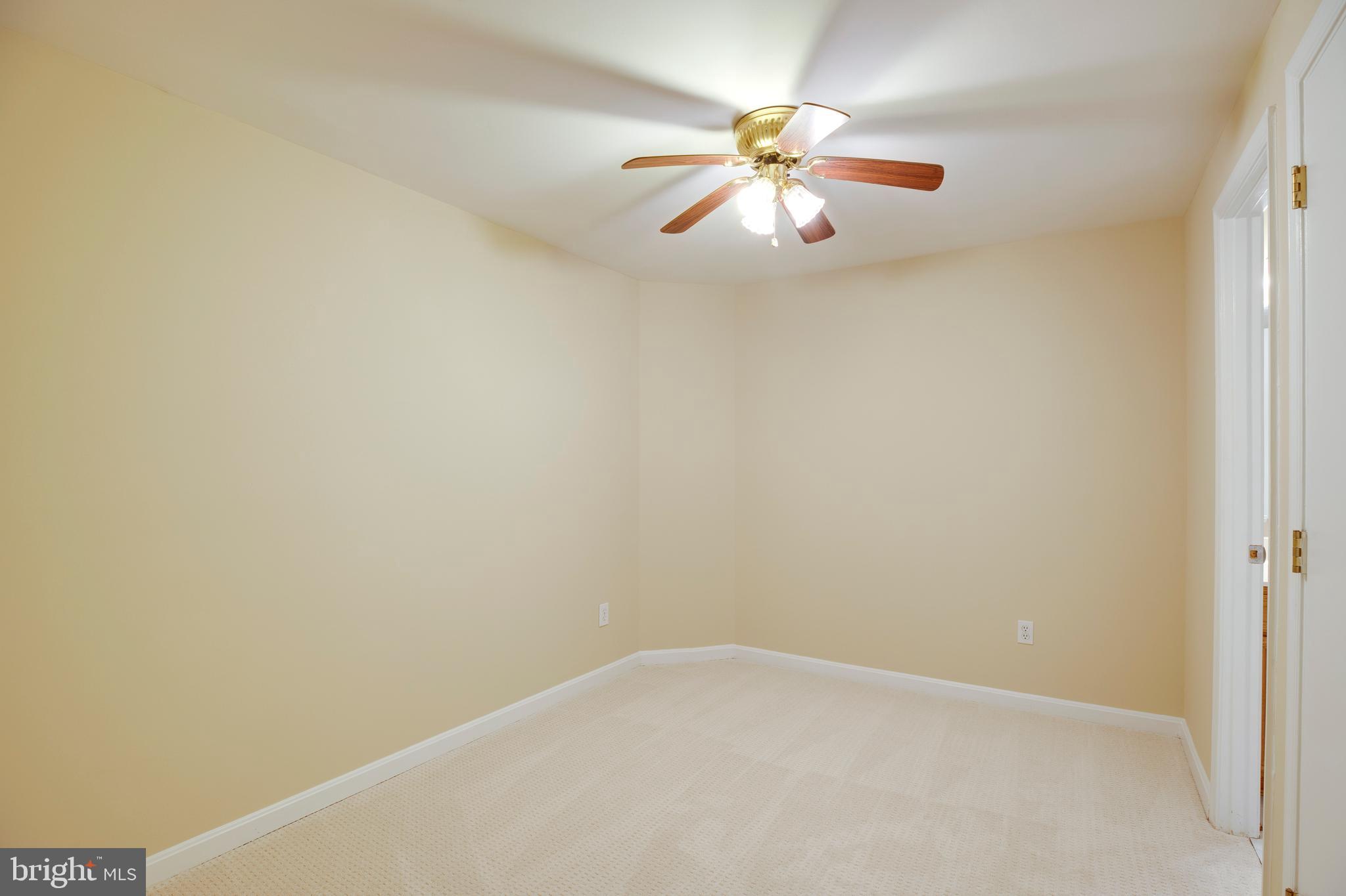 14113 Asher View Centreville, VA 20121 - Photo 34 of 47 an empty room with a chandelier fan and wooden floor