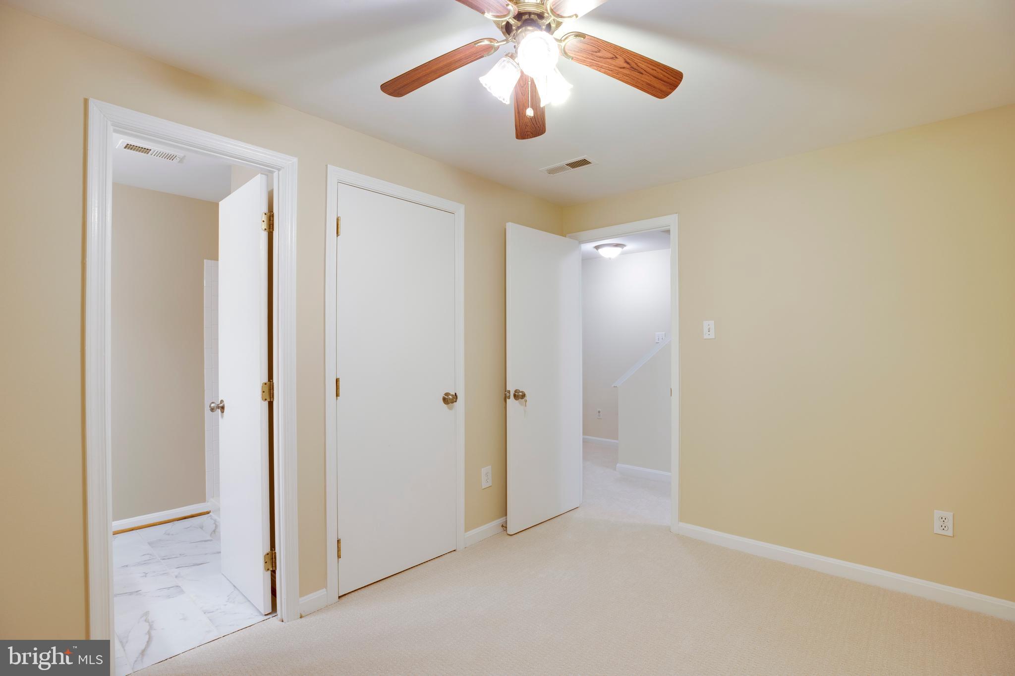 14113 Asher View Centreville, VA 20121 - Photo 35 of 47 a view of an empty room and chandelier fan