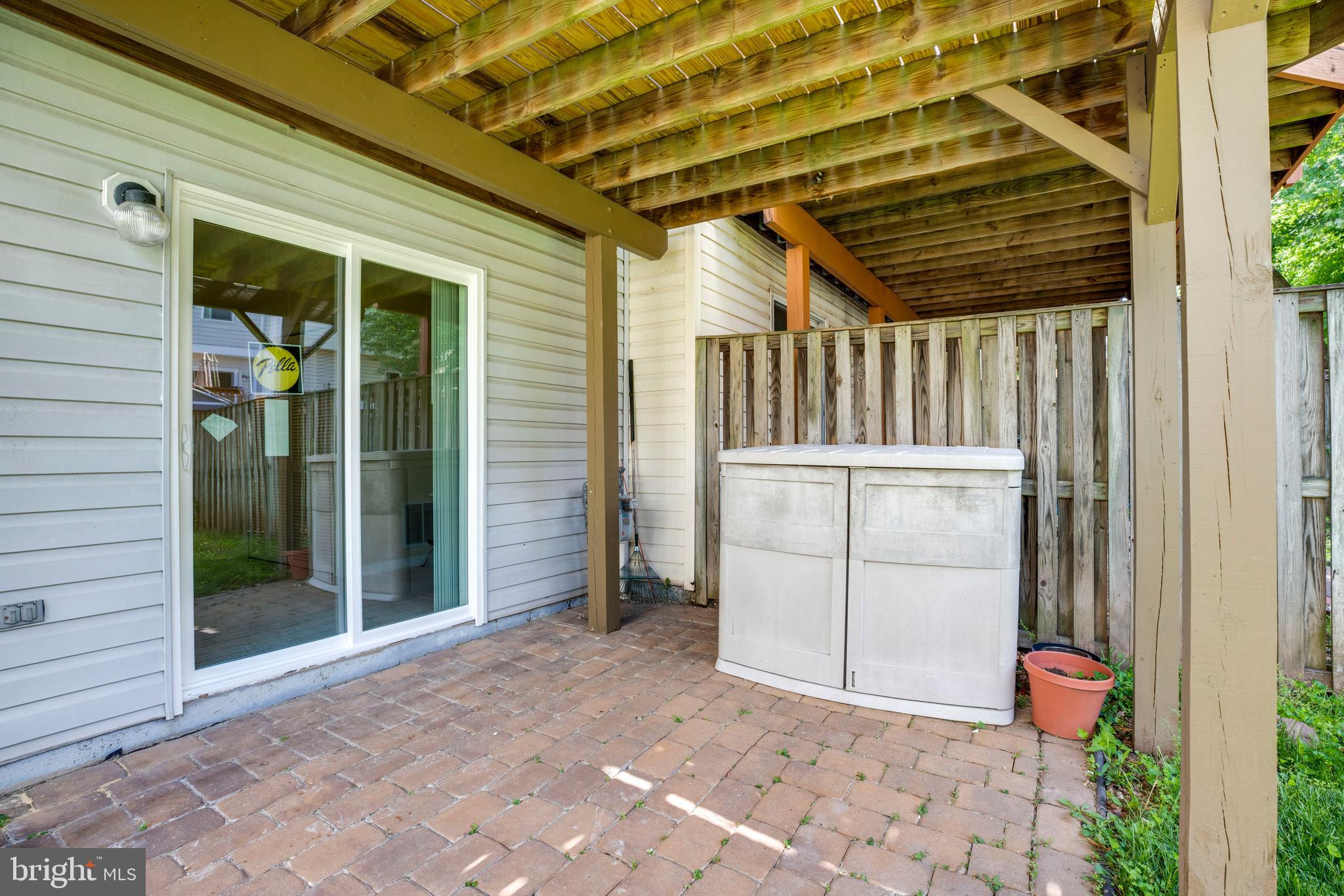 14113 Asher View Centreville, VA 20121 - Photo 42 of 47 a view of a porch with a door and wooden walls