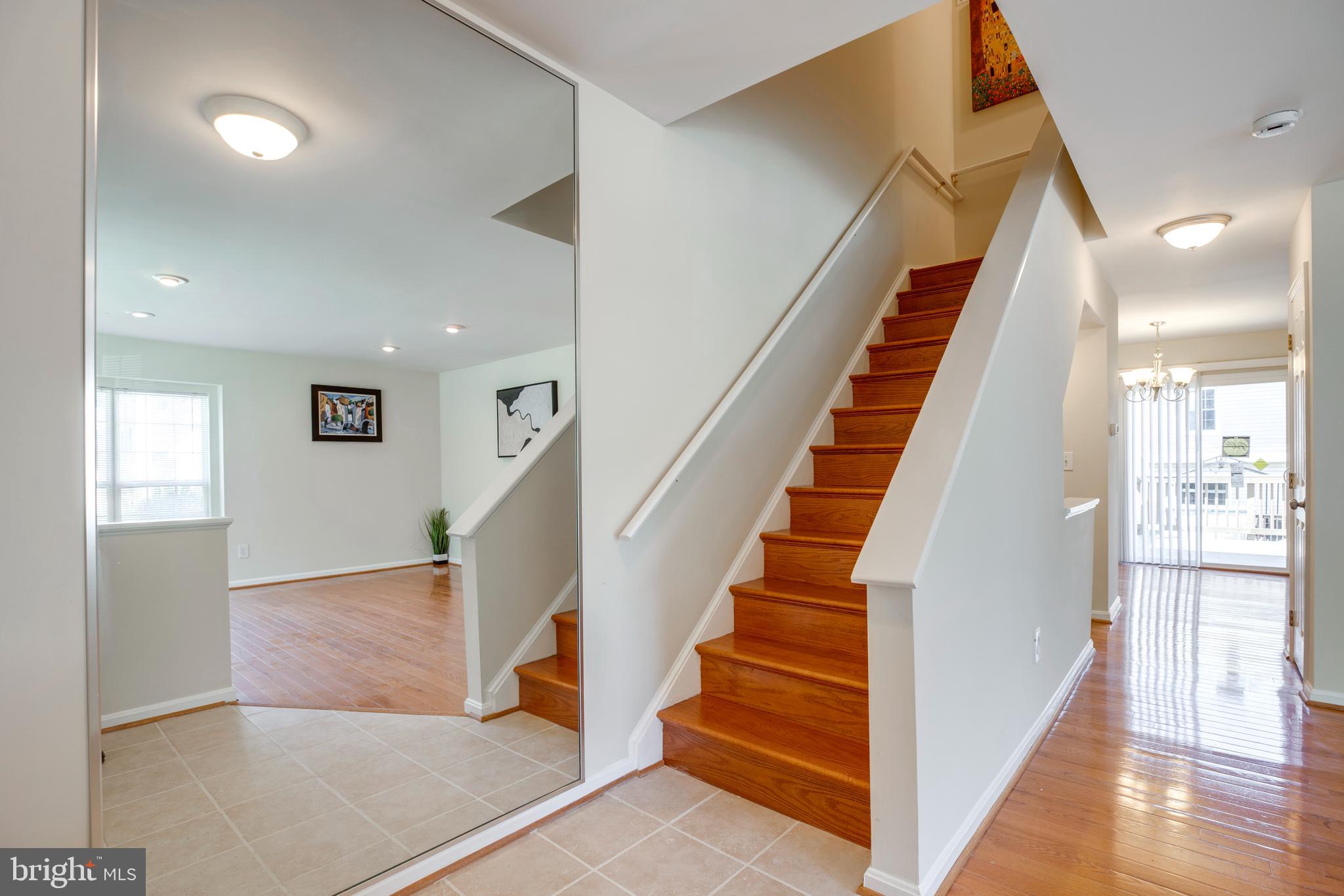 14113 Asher View Centreville, VA 20121 - Photo 8 of 47 a view of entryway and hall with wooden floor