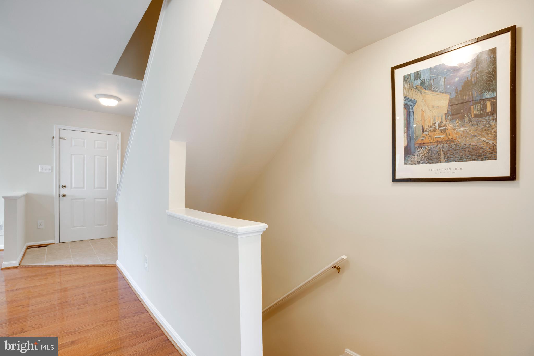 14113 Asher View Centreville, VA 20121 - Photo 9 of 47 a view of an empty room with wooden floor