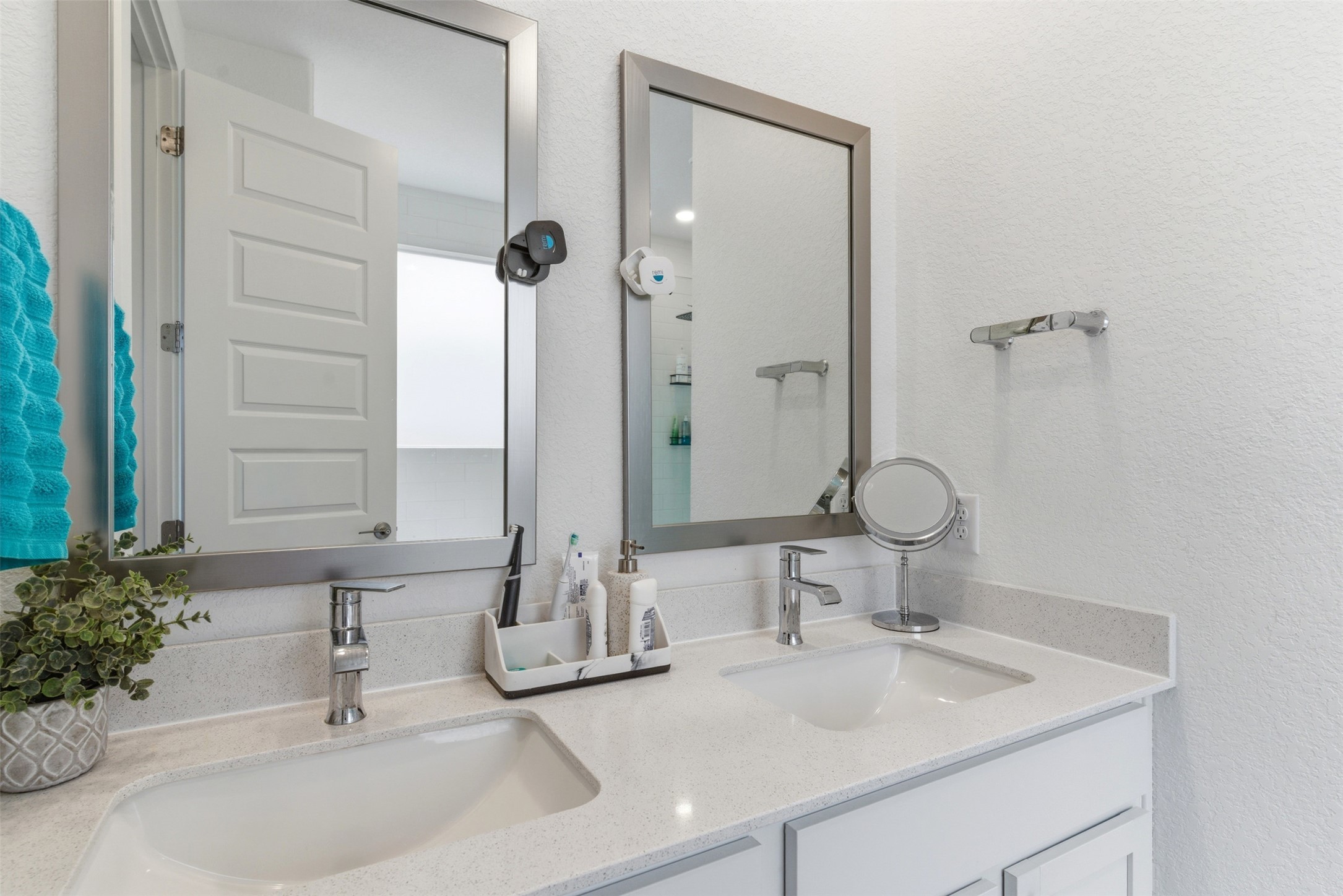 105 Nuntree Cove Georgetown, TX 78628 - Photo 14 of 31 a bathroom with a sink and a mirror