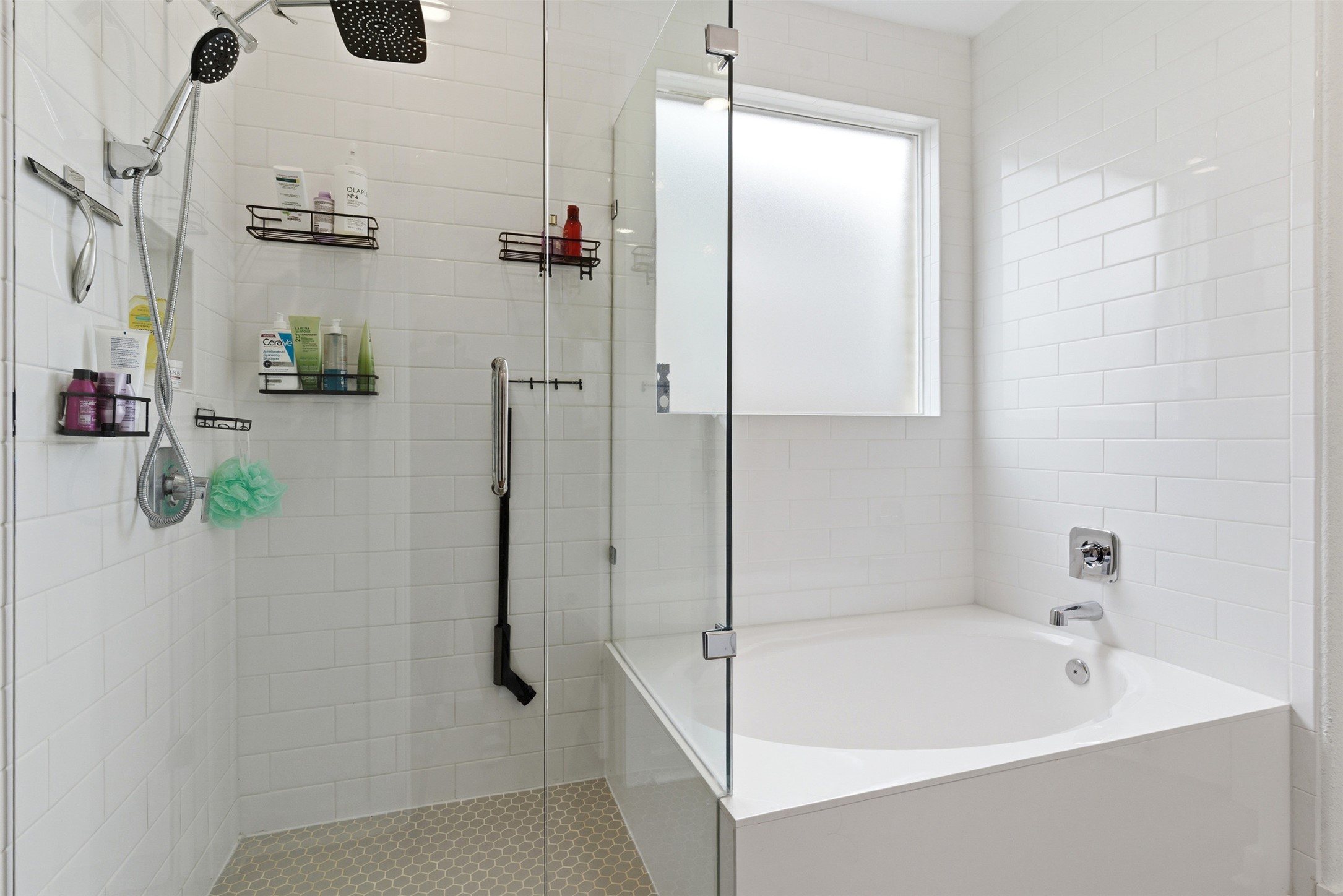 105 Nuntree Cove Georgetown, TX 78628 - Photo 15 of 31 a bathroom with a tub and shower
