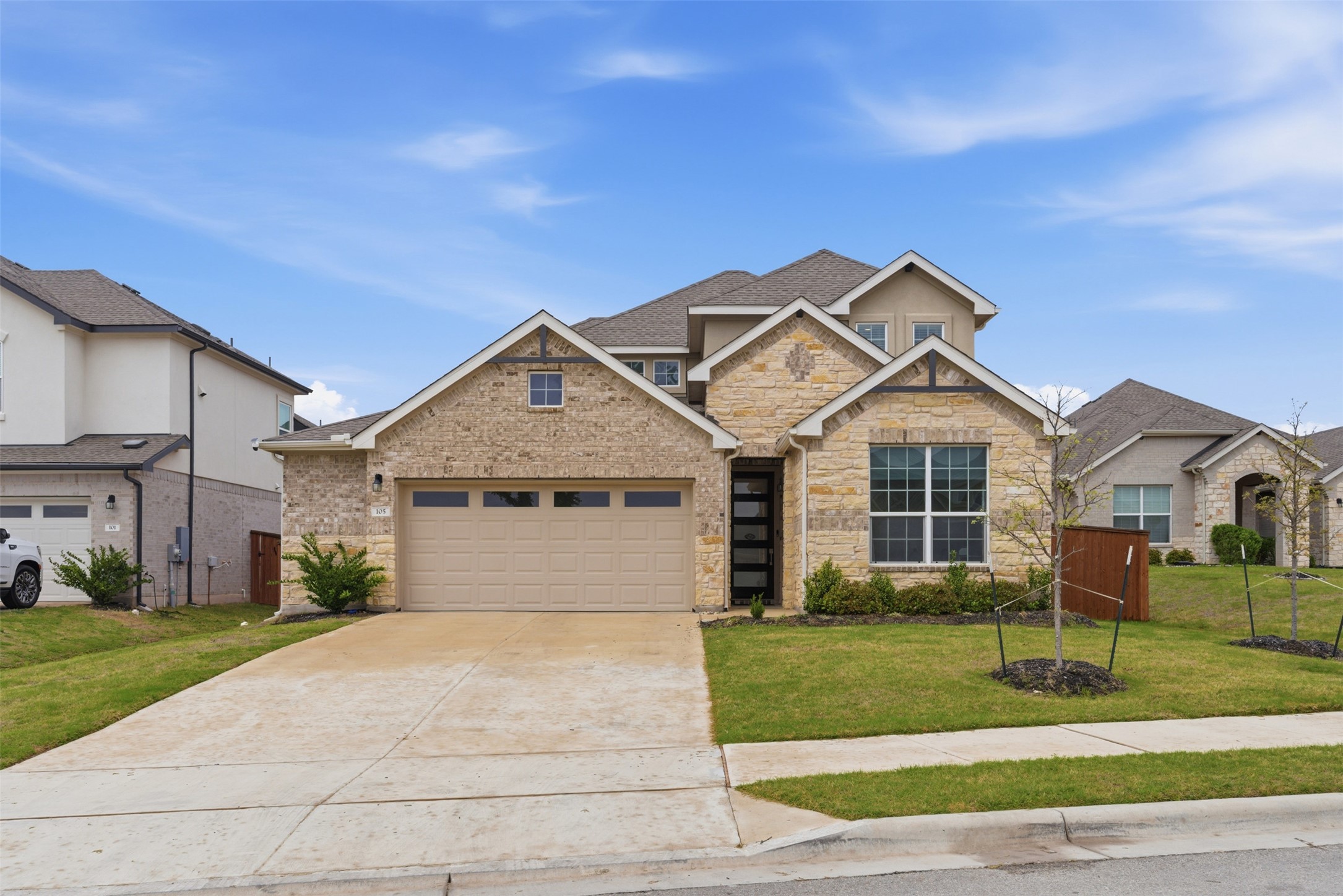 105 Nuntree Cove Georgetown, TX 78628 - Photo 2 of 31 a front view of a house with a yard