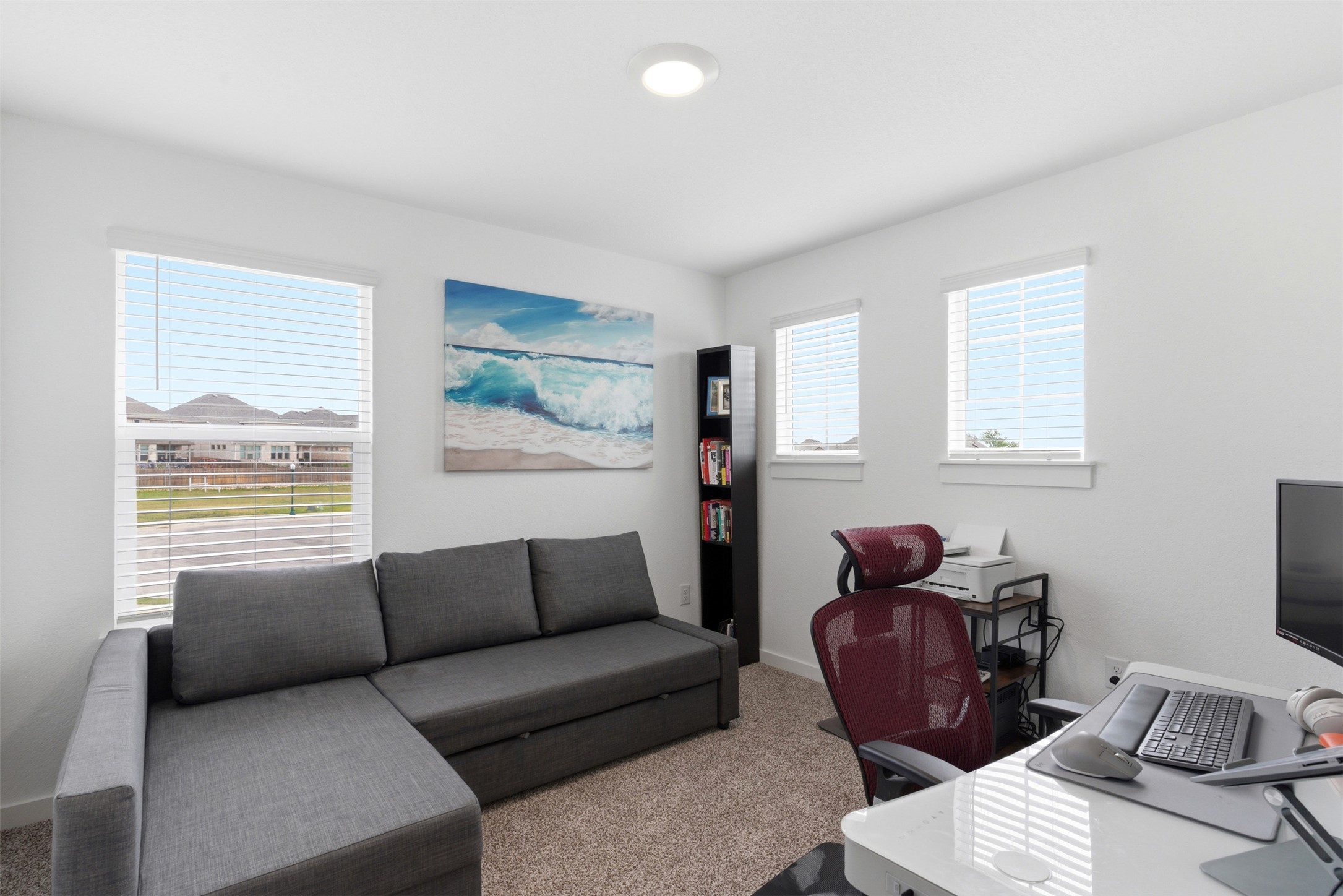 105 Nuntree Cove Georgetown, TX 78628 - Photo 22 of 31 a living room with furniture a window and a flat screen tv