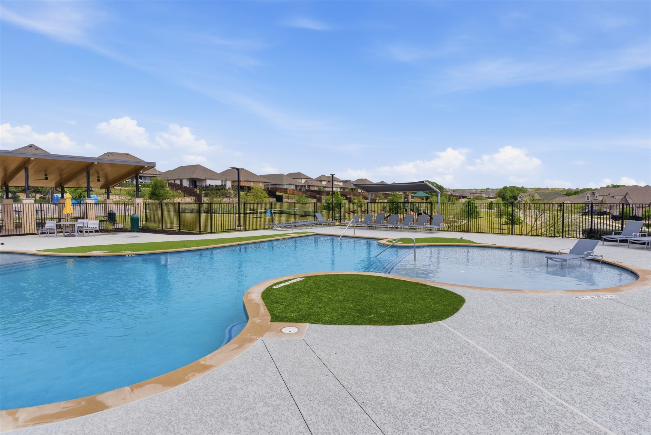 105 Nuntree Cove Georgetown, TX 78628 - Photo 27 of 31 a view of swimming pool with a table and chairs