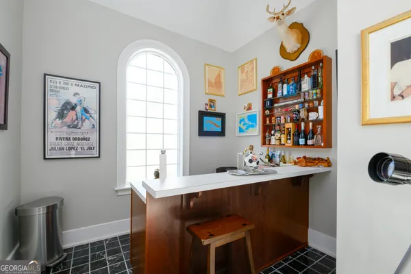 a bathroom with a double vanity sink and mirror
