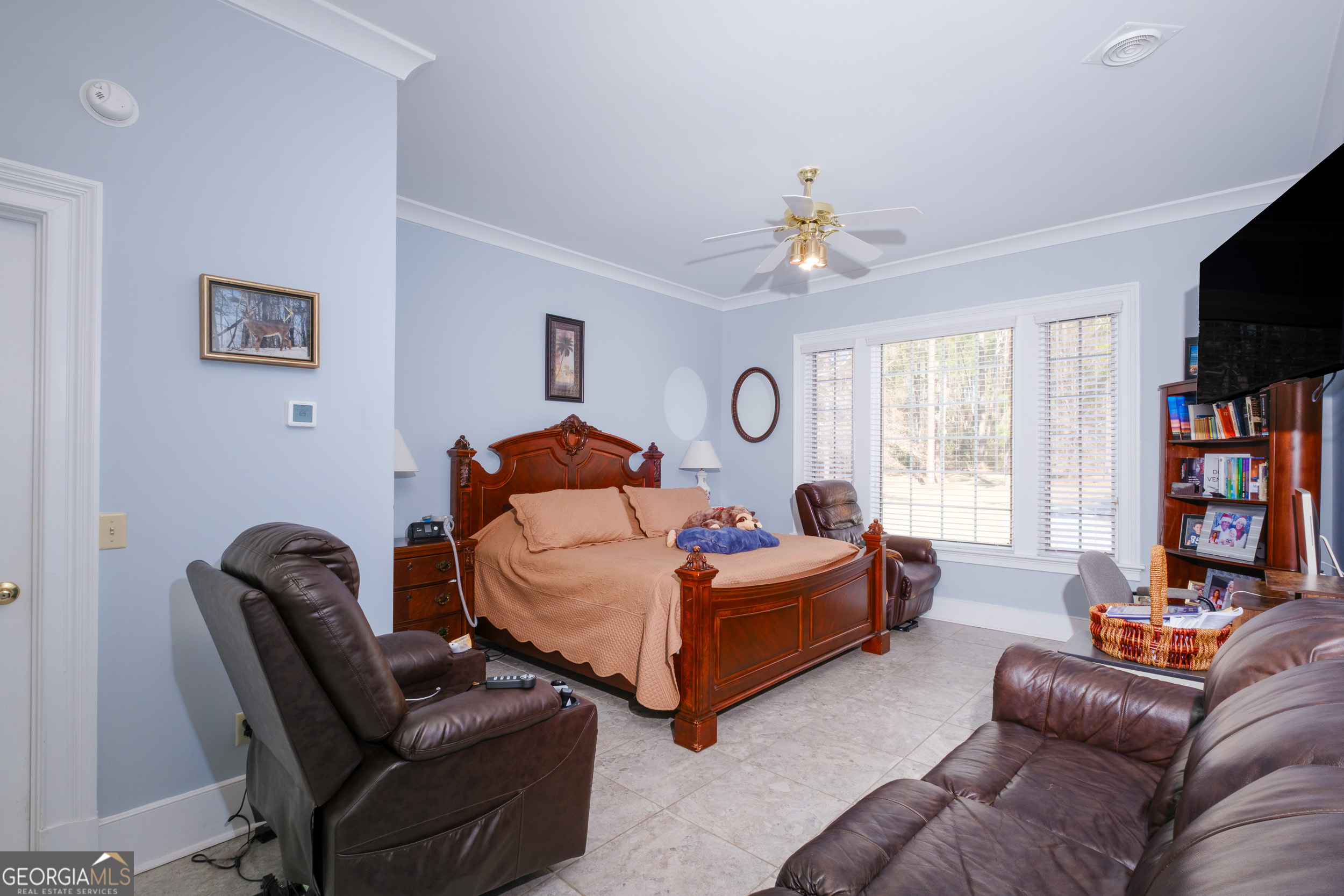 1900 Country Club Road Statesboro, GA 30458 - Photo 24 of 80 a bedroom with a bed couch and a window