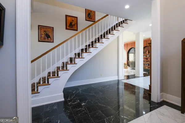 a bathroom with a shower curtain and a curtain