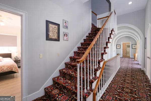 a view of house with outdoor seating and city view
