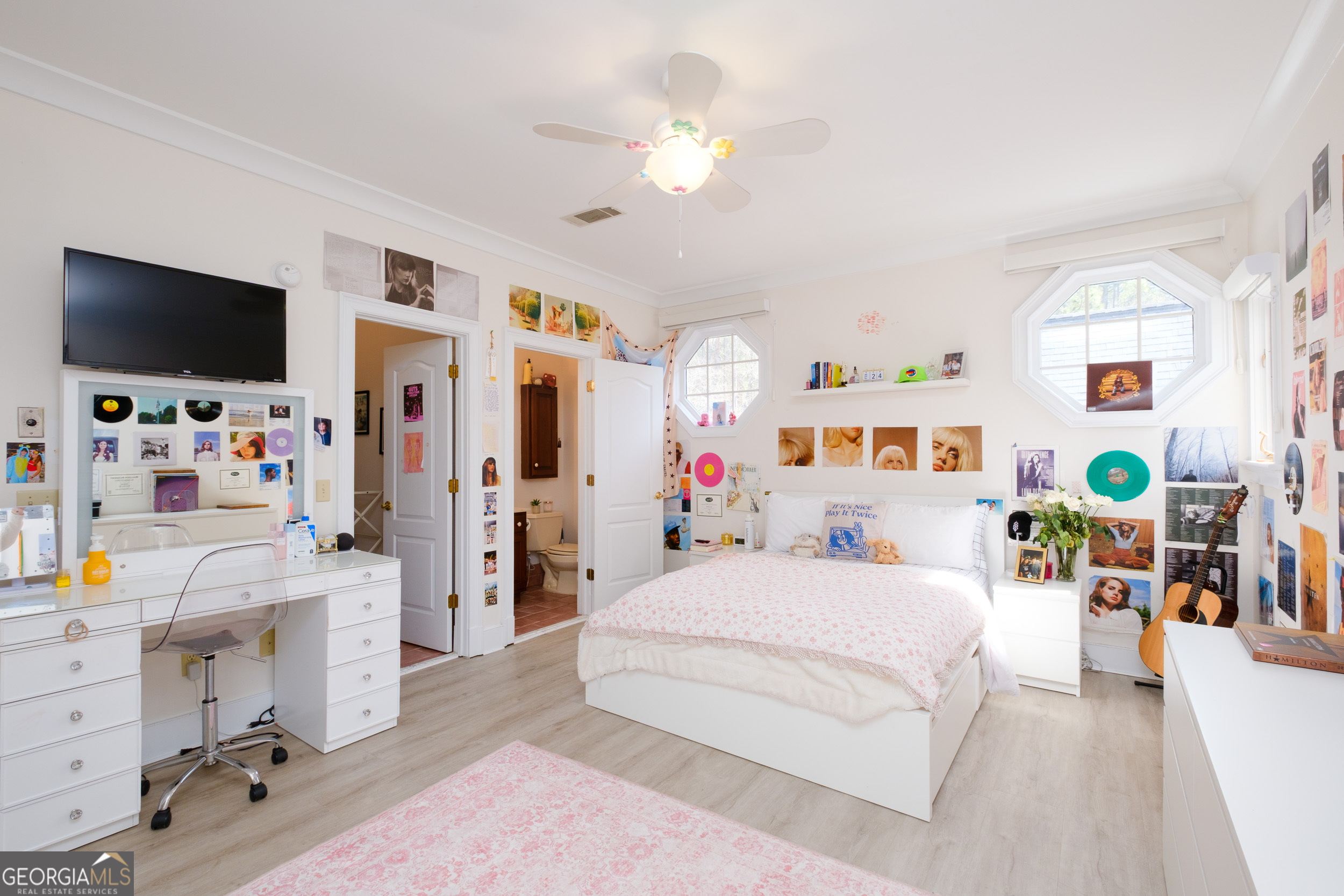 1900 Country Club Road Statesboro, GA 30458 - Photo 39 of 80 a bedroom with a bed a flat screen tv and a window