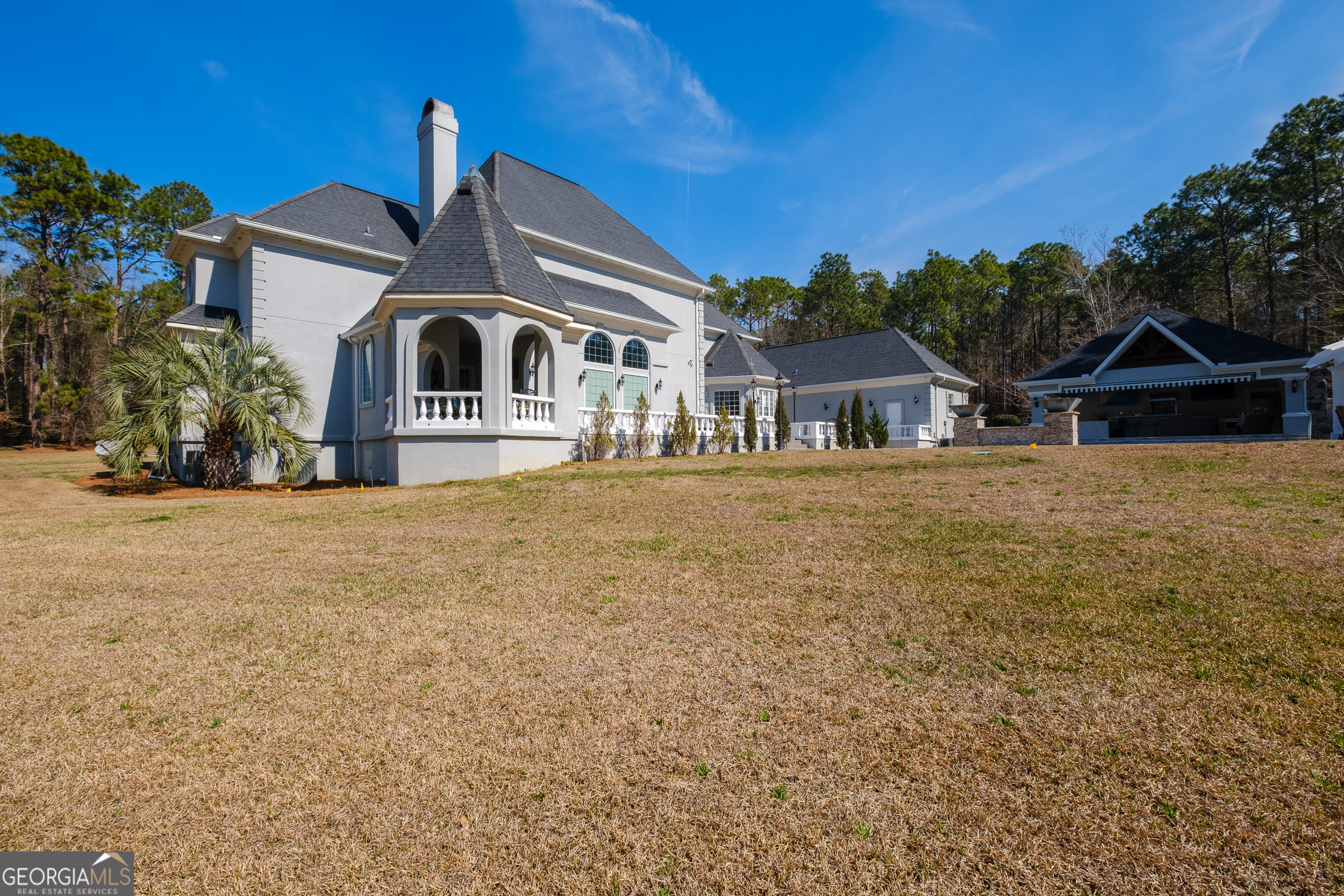 1900 Country Club Road Statesboro, GA 30458 - Photo 70 of 80 a front view of a house with a yard