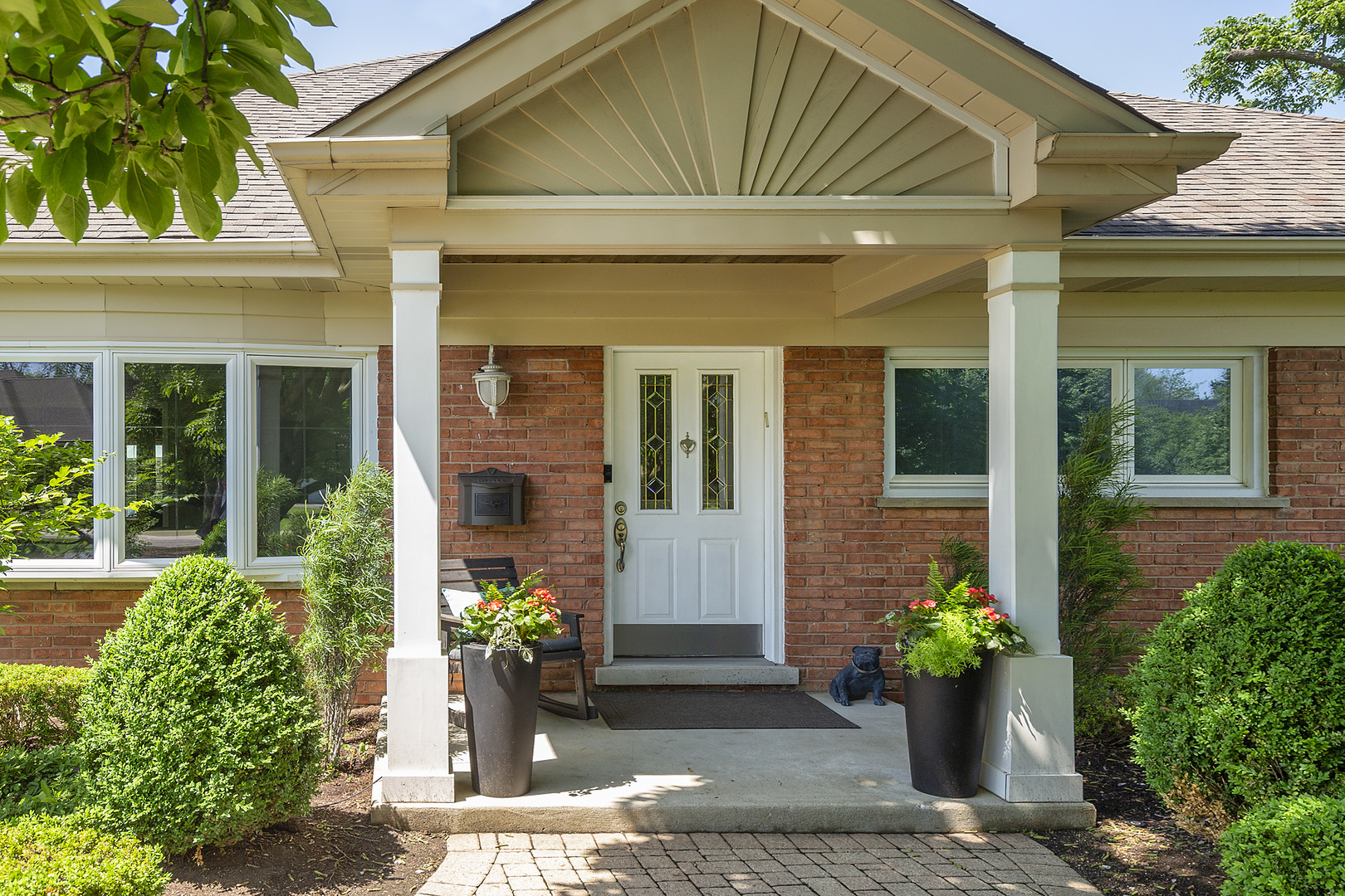 2040 Maplewood Road Northbrook, IL 60062 - Photo 1 of 30 a front view of a house having patio