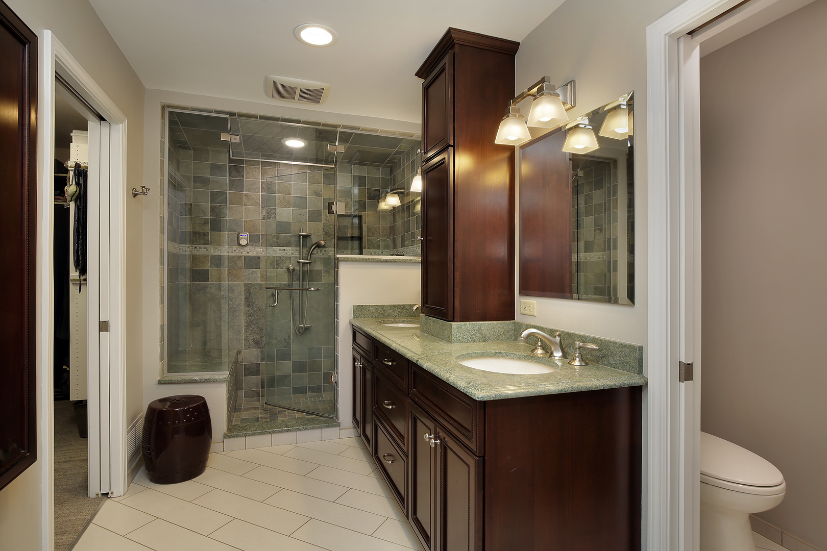 2040 Maplewood Road Northbrook, IL 60062 - Photo 12 of 30 a bathroom with a sink vanity and a mirror