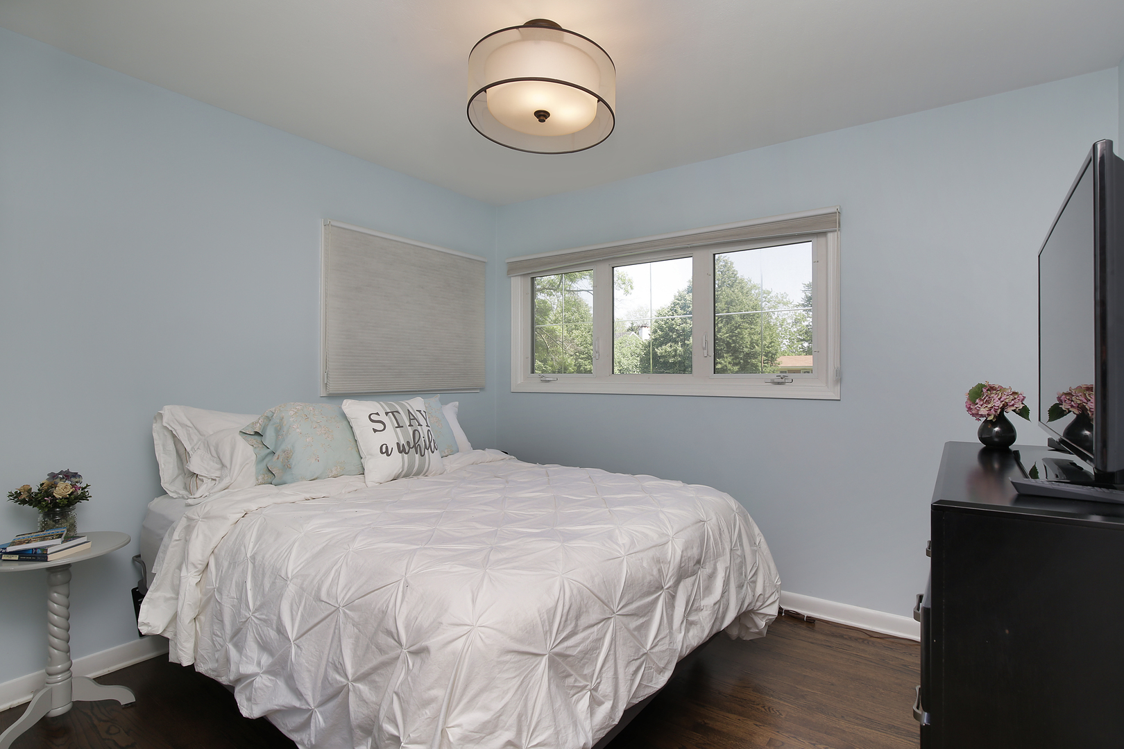 2040 Maplewood Road Northbrook, IL 60062 - Photo 13 of 30 a bedroom with double bed and a window