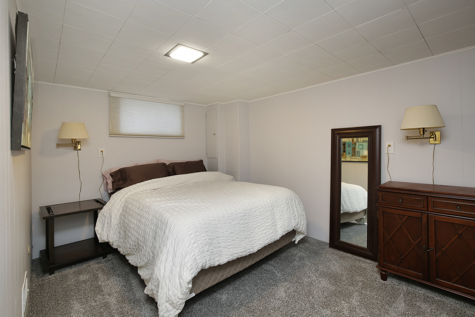 2040 Maplewood Road Northbrook, IL 60062 - Photo 20 of 30 a bedroom with a bed and cabinet