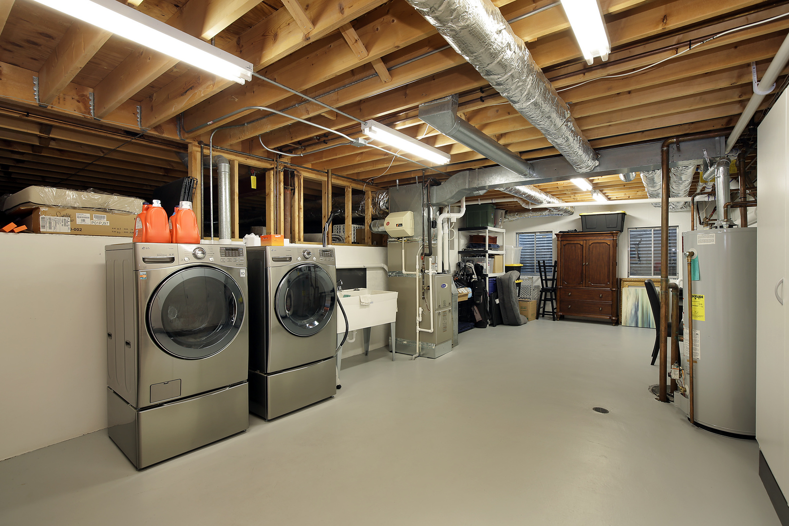 2040 Maplewood Road Northbrook, IL 60062 - Photo 22 of 30 a view of a storage and utility room with washer and dryer