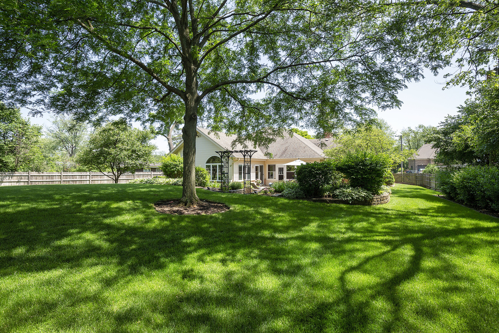 2040 Maplewood Road Northbrook, IL 60062 - Photo 25 of 30 a view of a house with a backyard