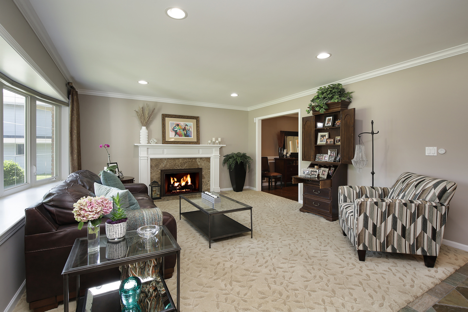 2040 Maplewood Road Northbrook, IL 60062 - Photo 4 of 30 a living room with furniture and a fireplace
