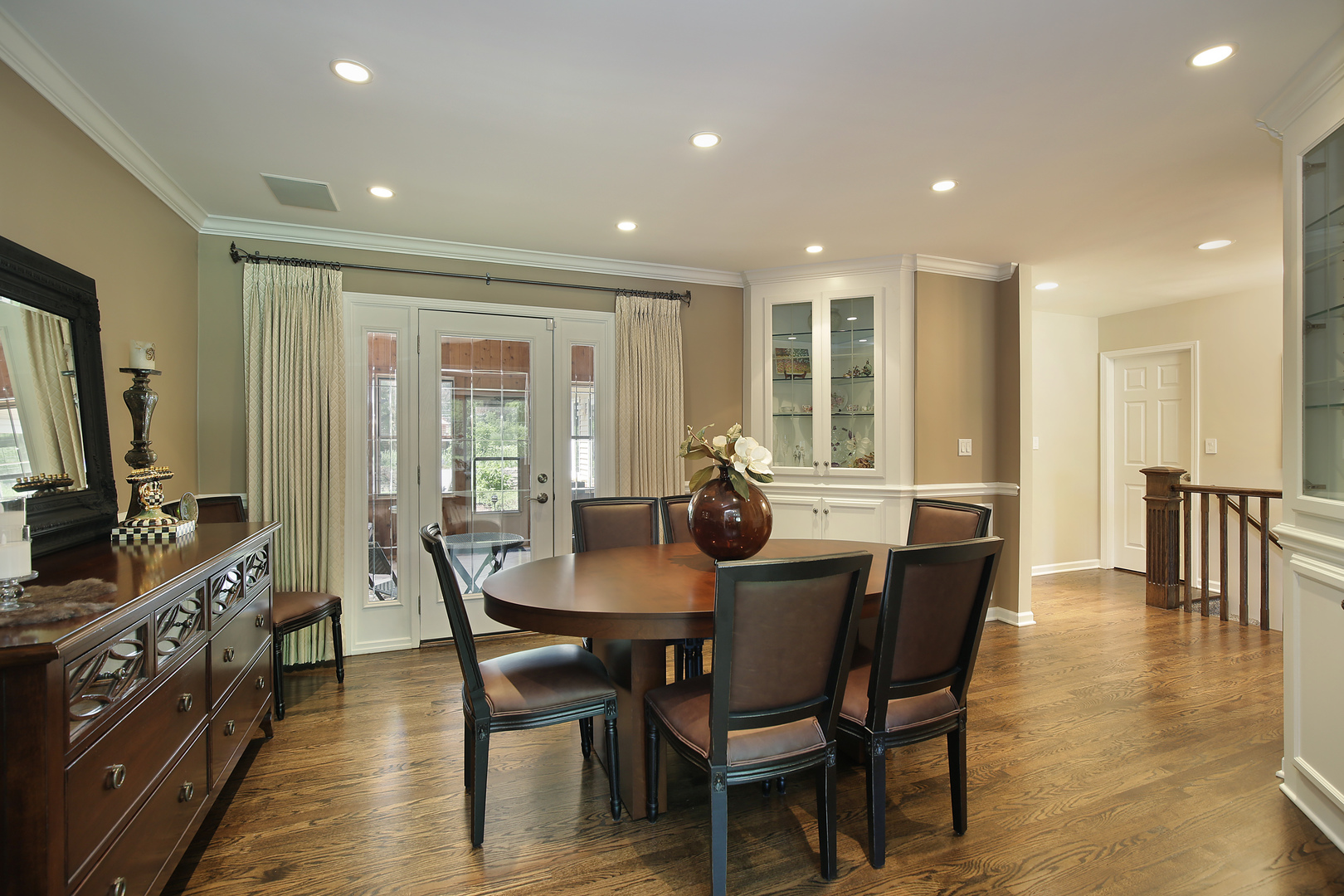 2040 Maplewood Road Northbrook, IL 60062 - Photo 10 of 30 a view of a dining room with furniture window and wooden floor