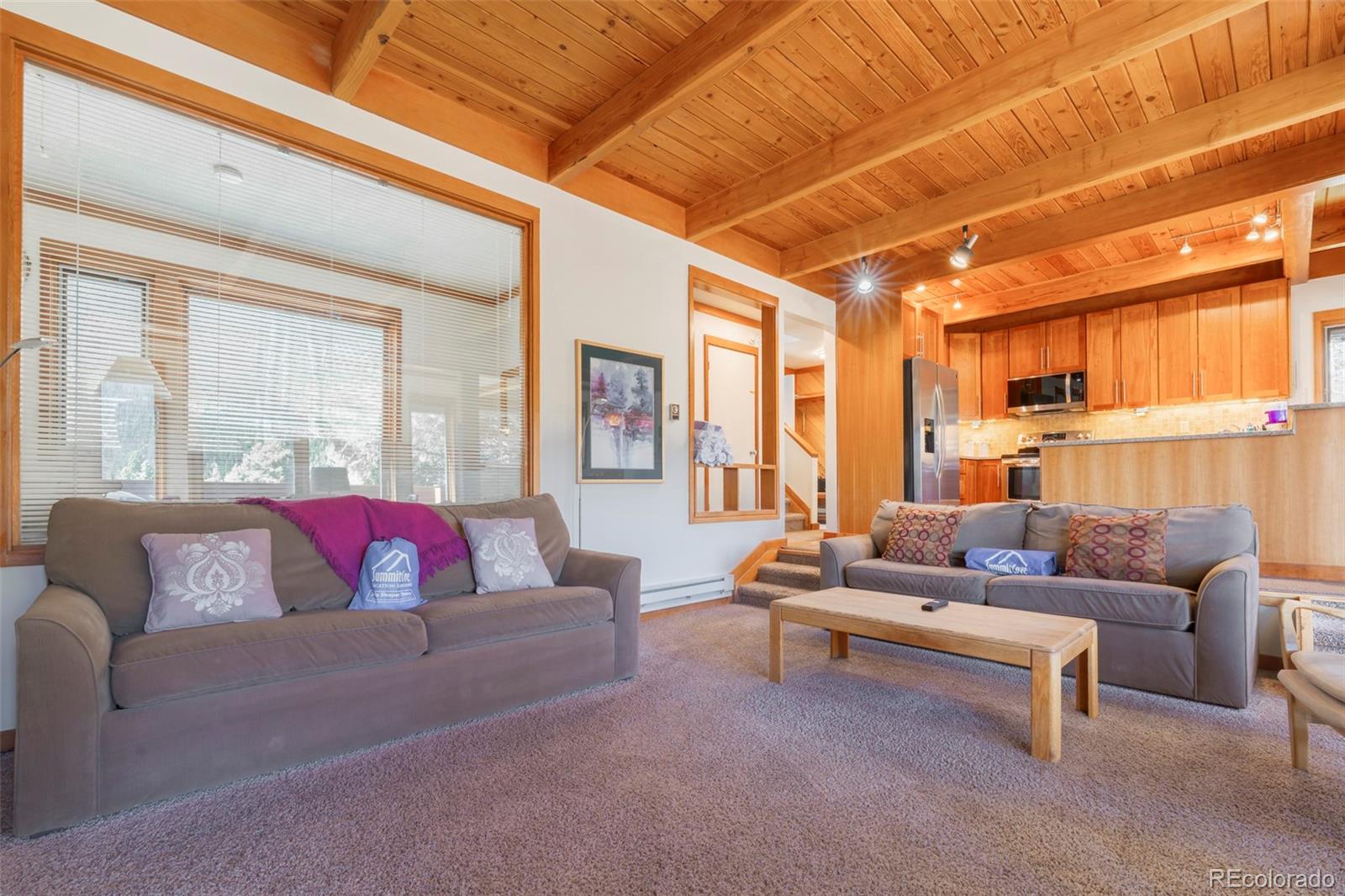350 Tennis Club Road, Unit 1311 Dillon, CO 80435 - Photo 18 of 45 a living room with furniture and a large window