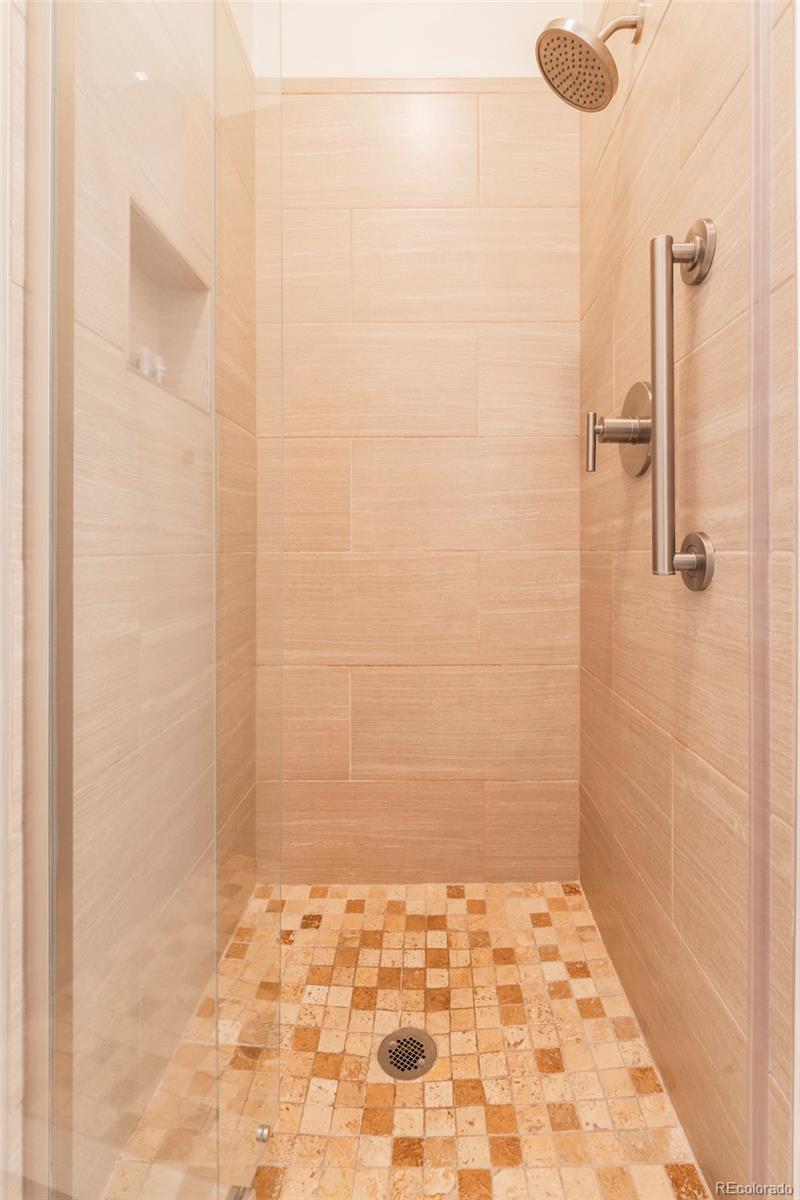 350 Tennis Club Road, Unit 1311 Dillon, CO 80435 - Photo 32 of 45 a bathroom with a shower