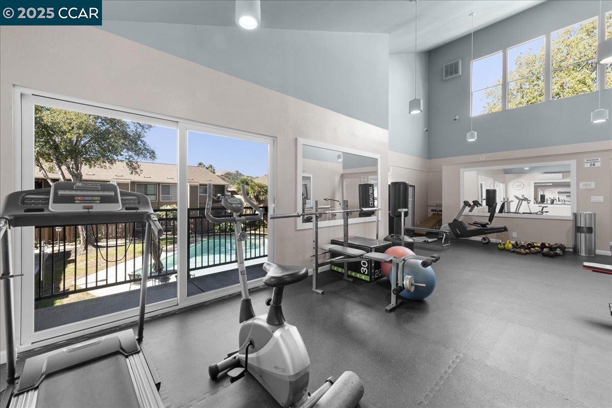 8975 Alcosta Boulevard, Unit 116 San Ramon, CA 94583 - Photo 22 of 31 a view of a room with gym equipment