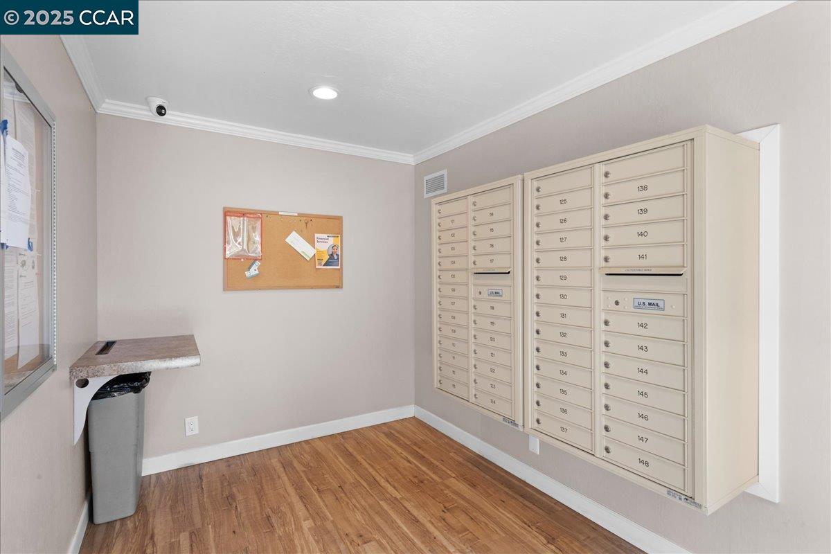 8975 Alcosta Boulevard, Unit 116 San Ramon, CA 94583 - Photo 27 of 31 a view of empty room with wooden floor