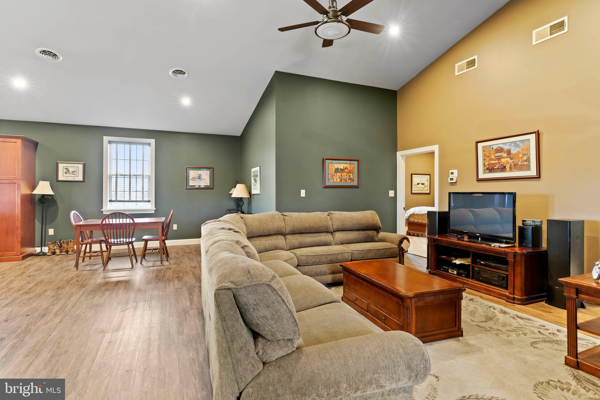 67 East Yellowbreeches Road Carlisle, PA 17015 - Photo 15 of 43 a living room with furniture and a flat screen tv