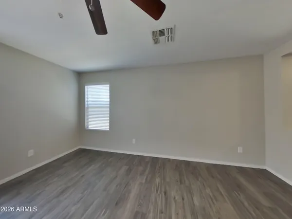 a bathroom with a toilet and a bathtub