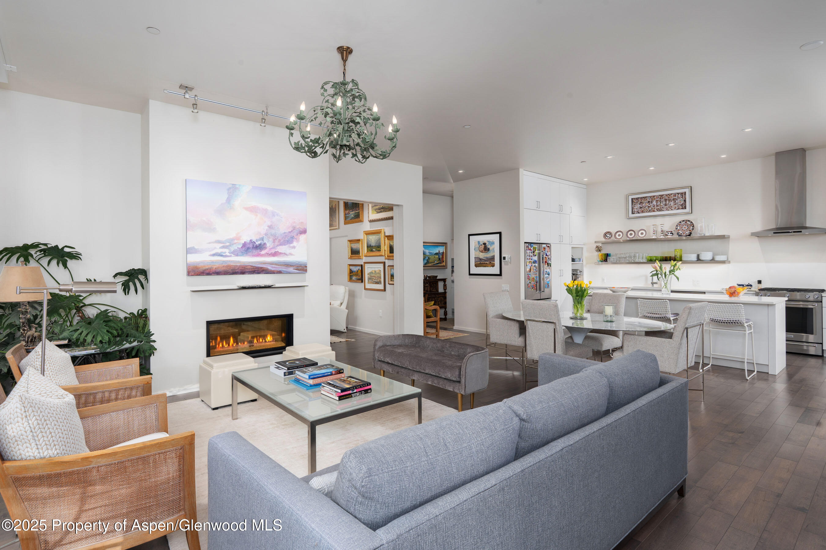 102 Evans Road, Unit 104 Basalt, CO 81621 - Photo 13 of 44 a living room with furniture and a fireplace